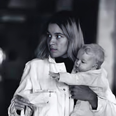 Jerry Garcia's second wife, Carolyn Adams, and their child.